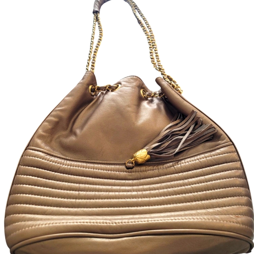 Fellini chrome colored purse with gold and chrome handle